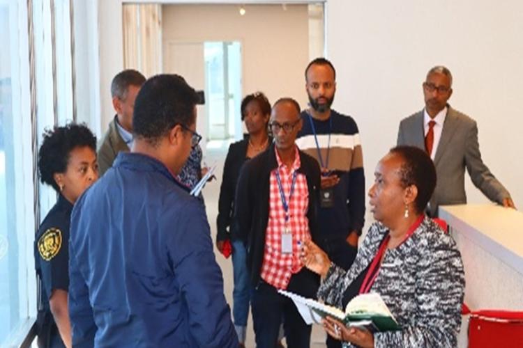 ECA Facility Management Section (FMS) team handing over the renovated ECA library space to KMSS Chief