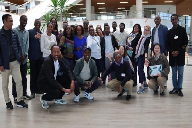 Participants of the Community Librarians training workshop and staff members of ECA Library in a family photo on a visit to the Abrehot Public Library in Addis Ababa.