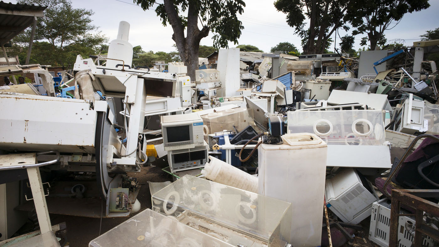 A dumping ground for old medical equipment in Malawi. Africa spends $3 billion and $4 billion on medical devices to improve healthcare, but without spare parts or trained technicians, the devices stop working almost immediately, and equipment graveyards become their resting place. Photo © Stephen Rudy/Courtesy of Gradian Health.