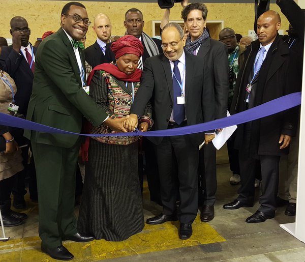 Africa Pavilion official opening, the twenty-first session of the Conference of the Parties to the United Nations. Framework Convention on Climate Change, held in Paris, November 2015. Shown cutting the symbolic ribbon are the President of the African Development Bank, Akinwumi Adesina; Chairperson of the African Union Commission, Nkosazana Dlamini-Zuma; and Executive Secretary of the Economic Commission for Africa, Carlos Lopes.