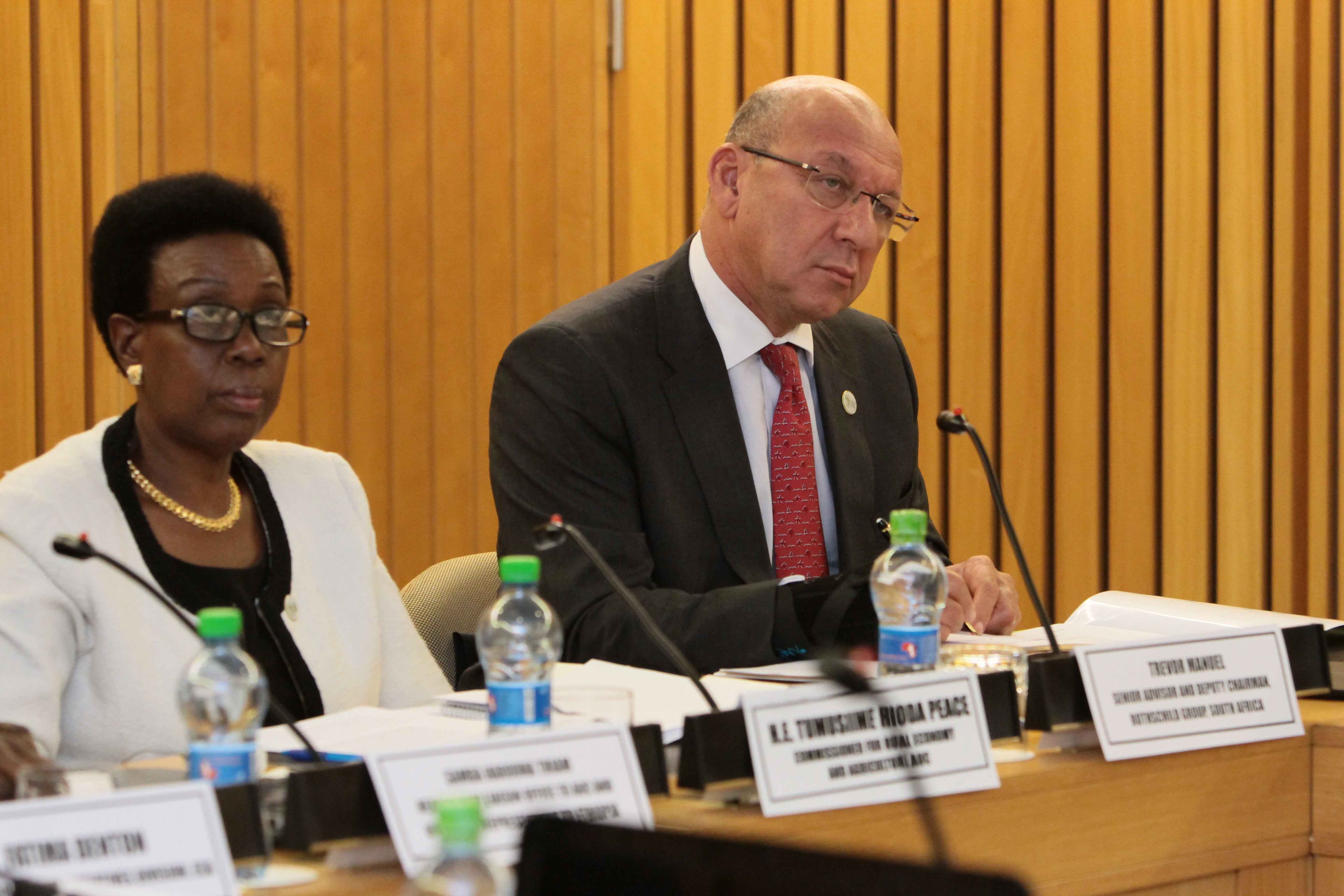 Trevor Manuel, former Finance Minister of South Africa (right) and H.E. Mrs. Tumusiime Rhoda, Peace Commissioner for Rural Economy and Agriculture, AUC at the 8th Joint Annual Meetings of the African Union Specialized Technical Committee on Finance, Monetary Affairs, Economic Planning and Integration and the ECA Conference of African Ministers of Finance, Planning and Economic Development, at Addis Ababa, March 2015. Photo © ECA.