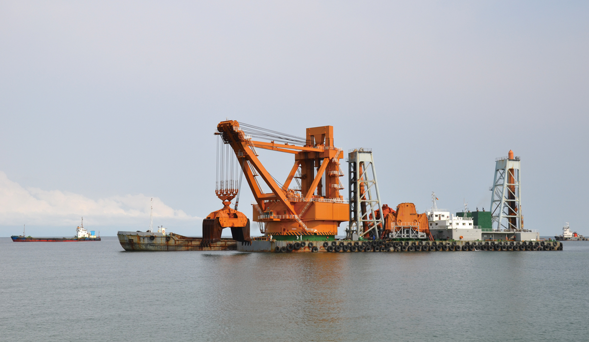 Construction work at the Kribi Deep Sea Port, located in the southwest of Cameroon. Thanks to the Central Africa Consensual Transport Master Plan framework and its own development needs, Cameroon concluded a study on the construction of the deep-sea port of Kribi in 2005 and completed the project in 2015, which has enabled the docking of vessels of up to 100,000 tons. Photo © CHEC