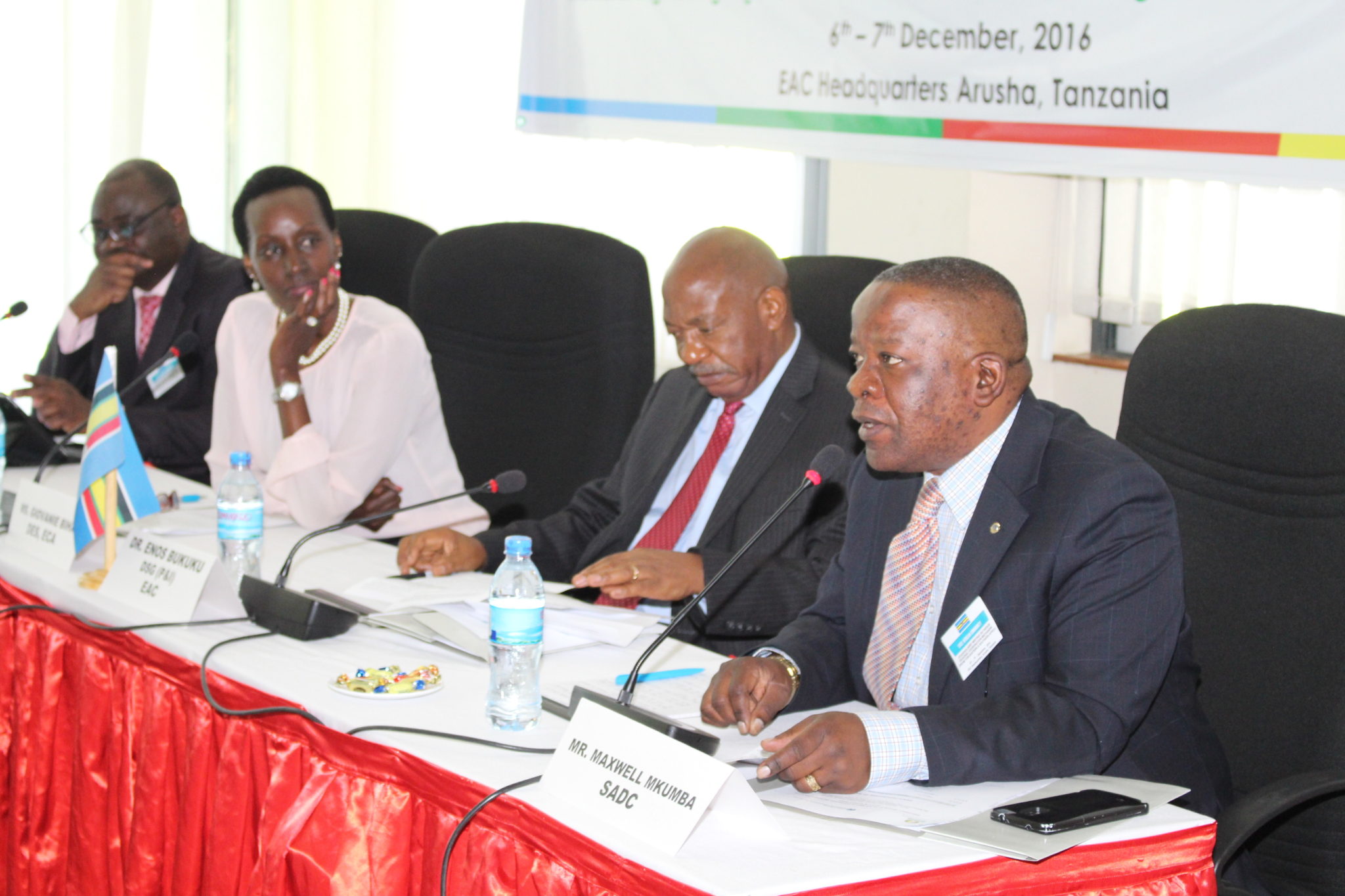 The Southern African Development Community (SADC) Senior Policy and Technical Coordinator, Maxwell Mkumba, making his remarks during the official opening of the Subregional Coordination Mechanism Meeting for Eastern and Southern Africa. With him, from left to right: ECA Subregional Office for Southern Africa, Said Ademujobi; ECA Deputy Executive Secretary, Giovanie Biha; and the East African Community Deputy Secretary-General in charge of Planning and Infrastructure, Enos Bukuku.