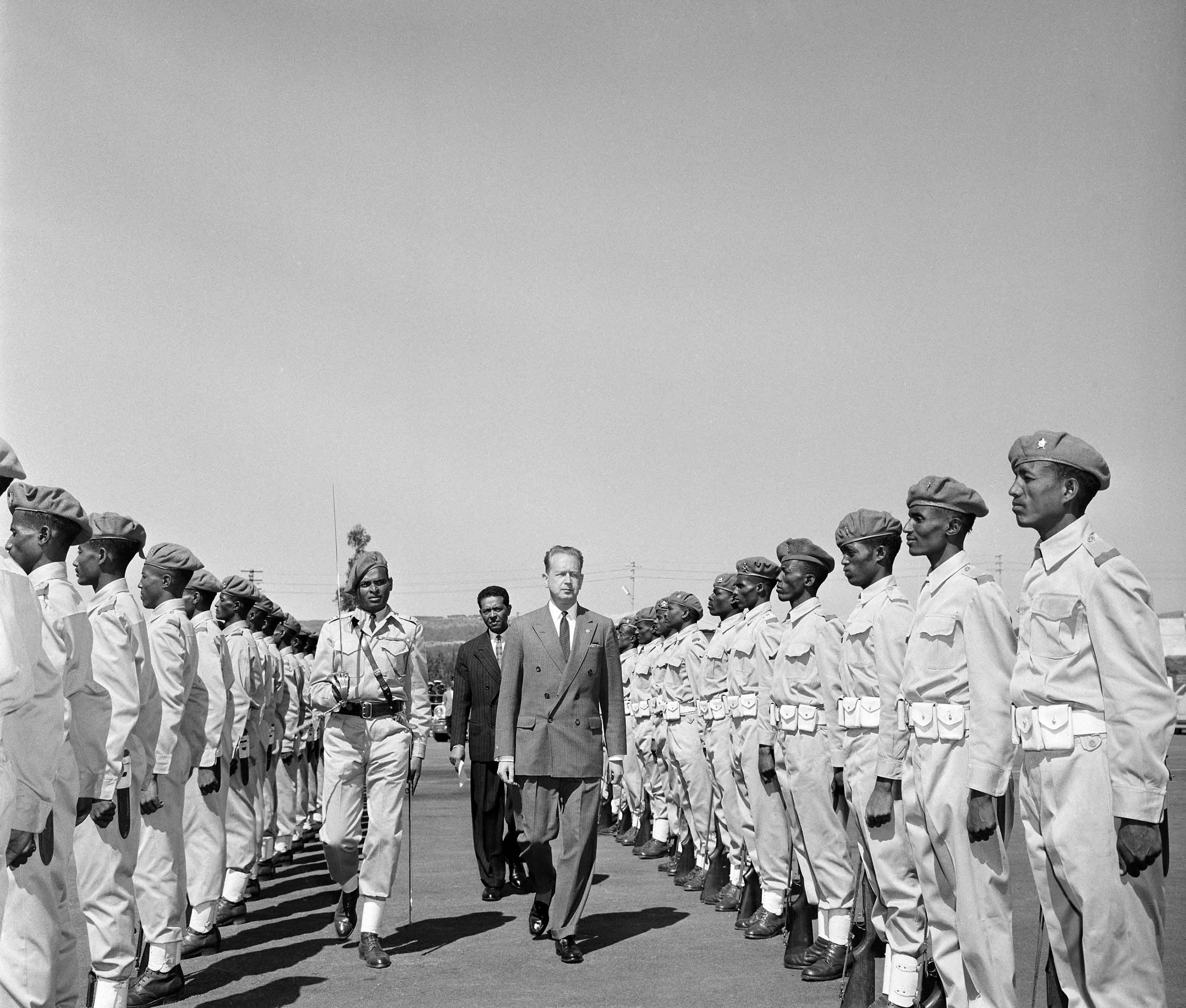Secretary-General, Dag Hammarskjöld, inspecting the Guard of Honour at the Addis Ababa Airport, 28 December 1958, ahead of the inaugural session of the Economic Commission for Africa, which was held on 29 December 1958.