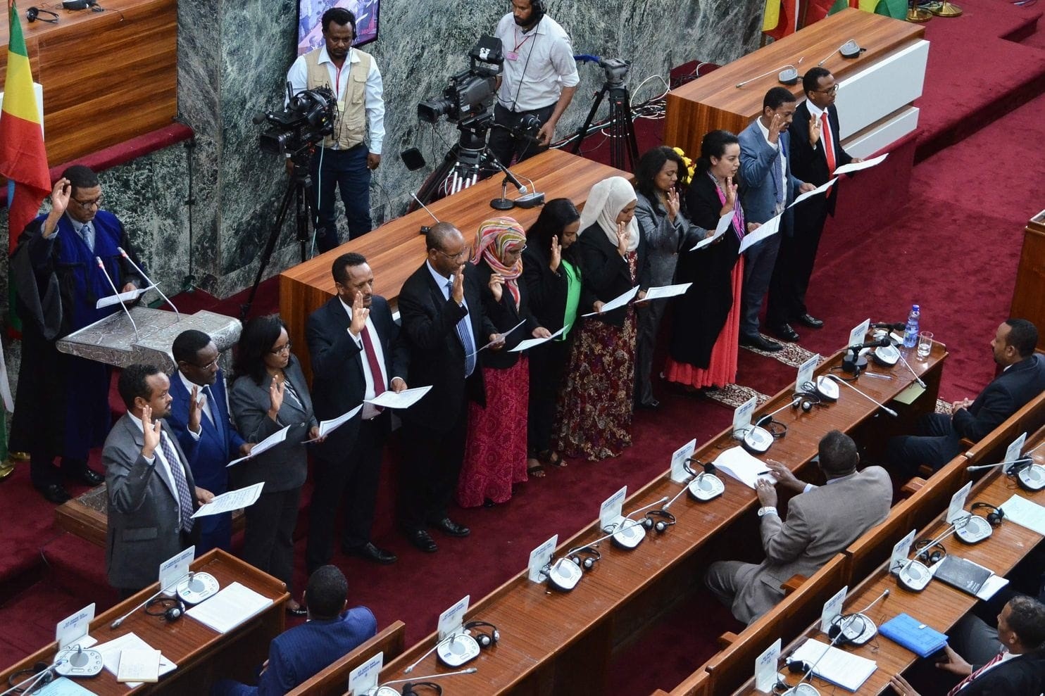 The newly appointed ministers of Ethiopia taking their oath in October 2018, after the 50-50 cabinet reshuffle that ensured 50 per cent men and 50 per cent women in the cabinet. Photo Credit: Pual, Schemm