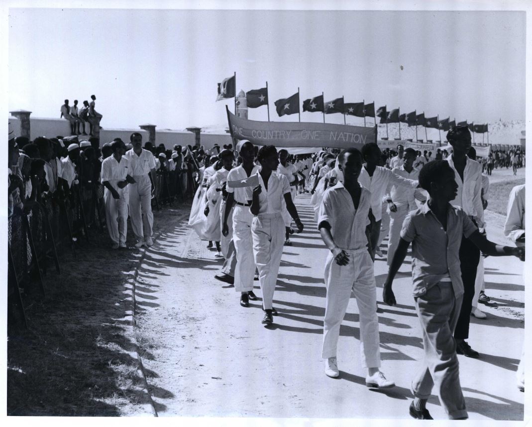 Somalia Celebration of Independence: The Republic of Somalia achieved its independence on 1 July 1960. This picture shows students of the Islamic Cultural Centre participating in a Parade at the Mogadiscio Football Stadium, carrying banners, flags and emblems. Somalia Celebration of Independence: The Republic of Somalia achieved its independence on 1 July 1960. This picture shows students of the Islamic Cultural Centre participating in a Parade at the Mogadiscio Football Stadium, carrying banners, flags and emblems.